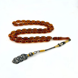 كهرمان طبيعي لون عسلي طربزون فضة