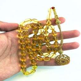 كهرمان طبيعي شفاف طربزونة فضة مذهب