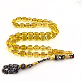 كهرمان طبيعي شفاف طربزونة فضة 